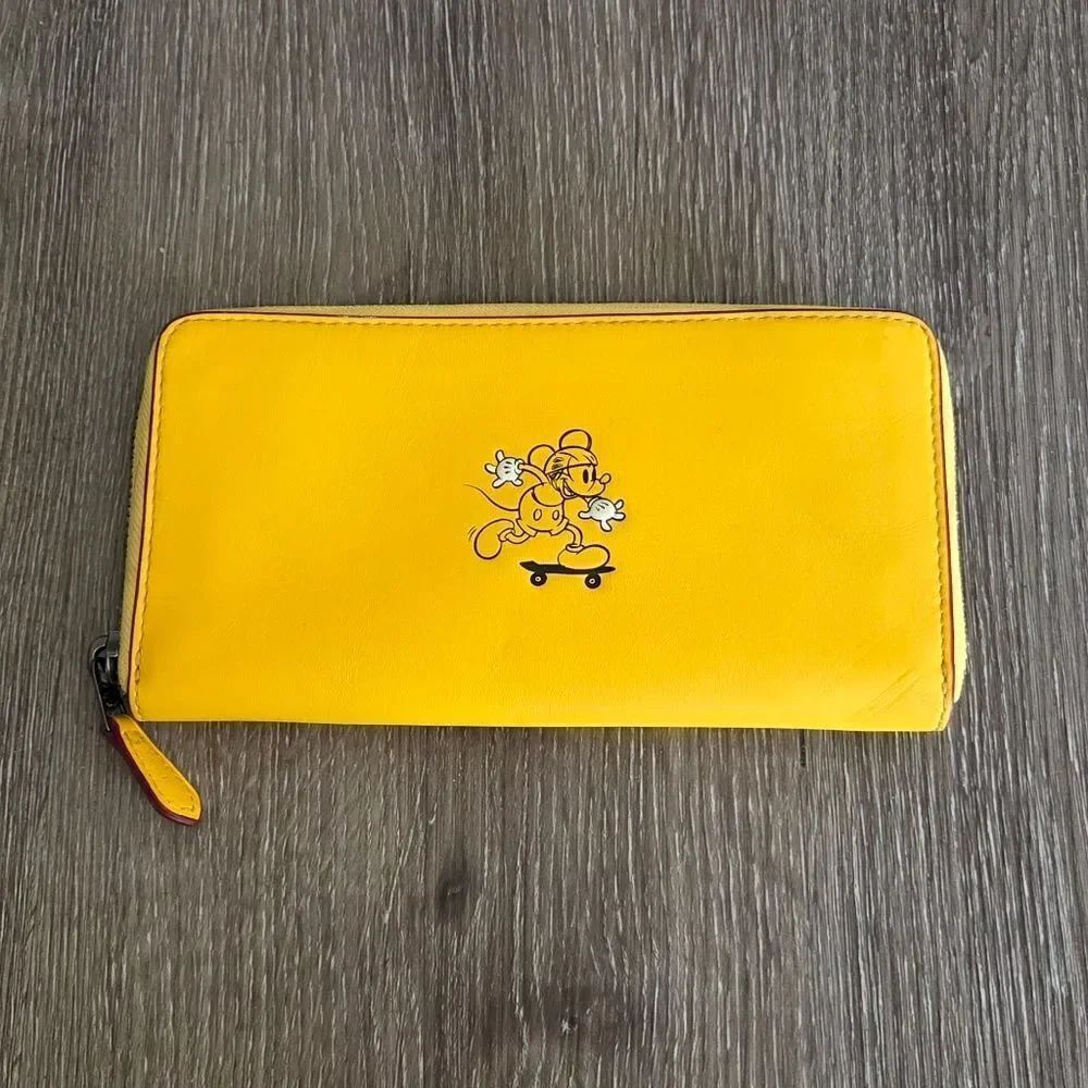 Coach Yellow Zip Wallet with Skateboarding Character